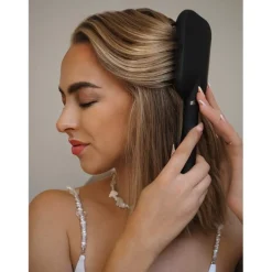 Bürsten Patentierte Haarbürste mit Selbstreinigungsfunktion von Bellody